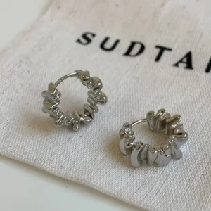 Boucles d'oreilles irrégulières argentées