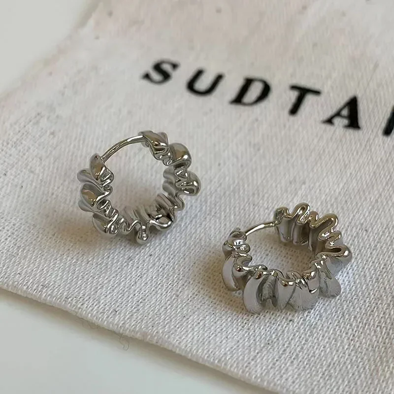 Boucles d'oreilles irrégulières argentées