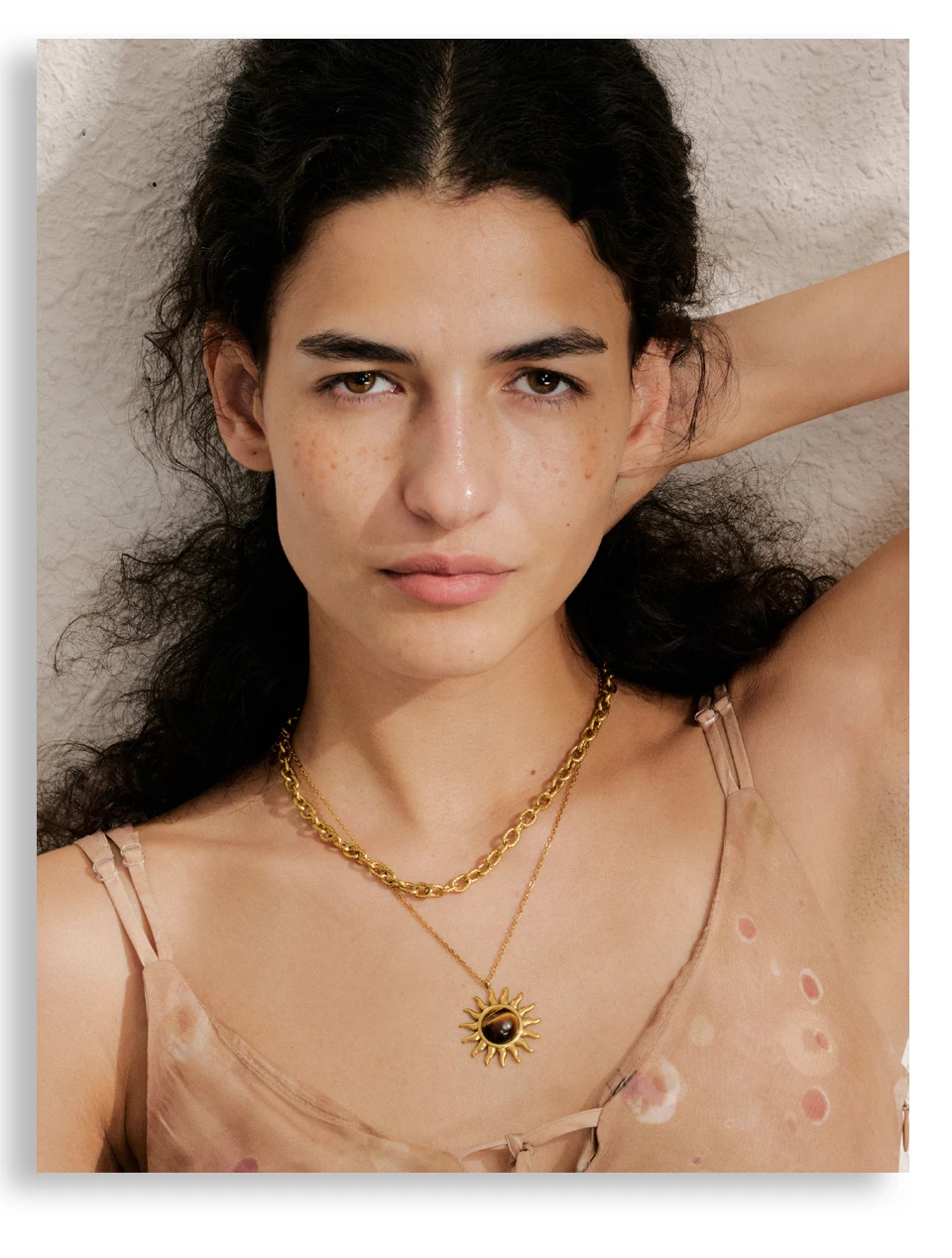 Collier à breloque soleil marron doré